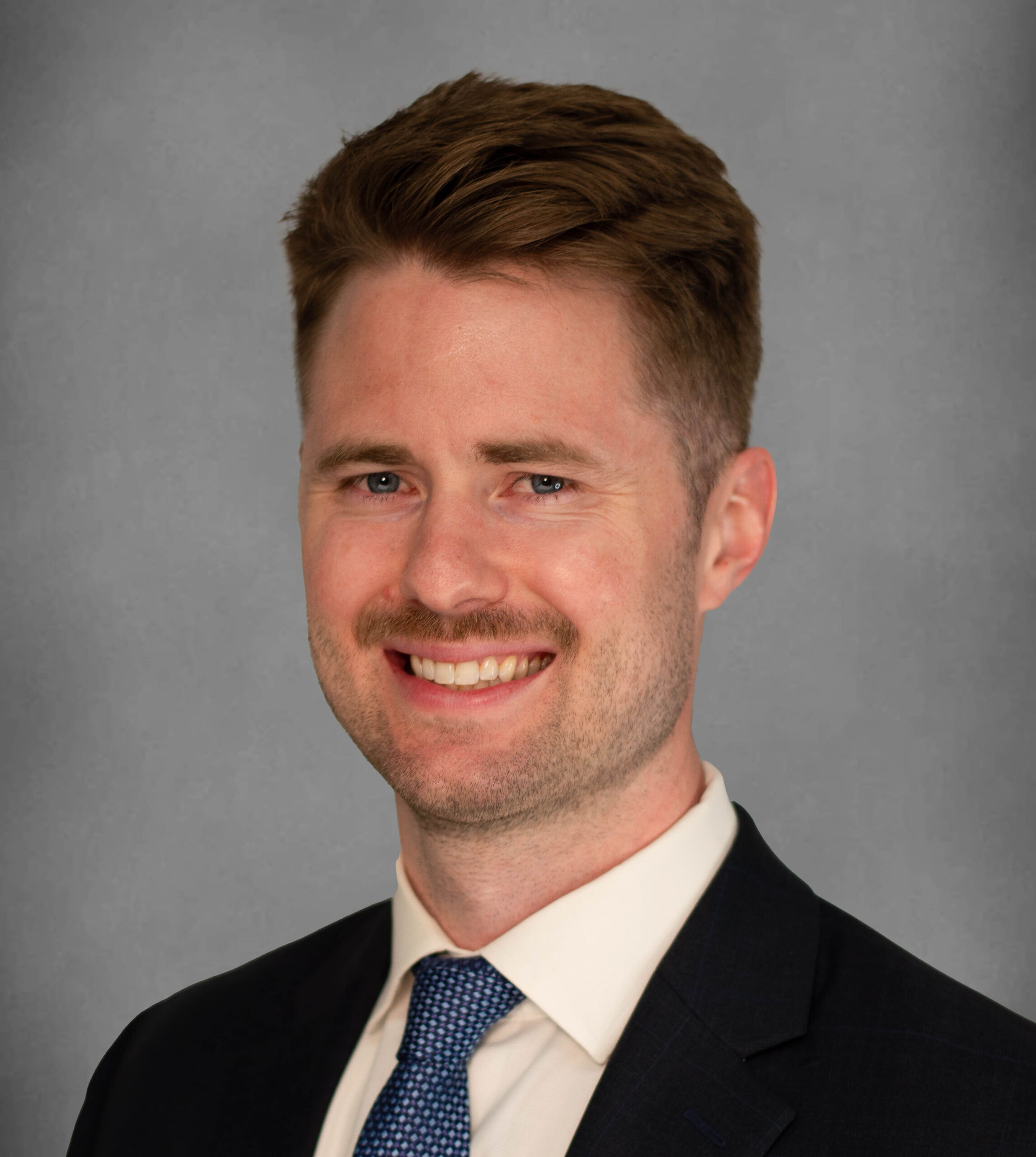 Professional headshot of an orthopaedic care provider (K Weisz)
