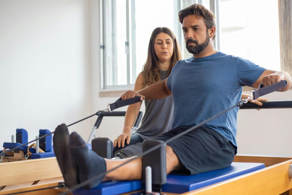 Man on rowing machine